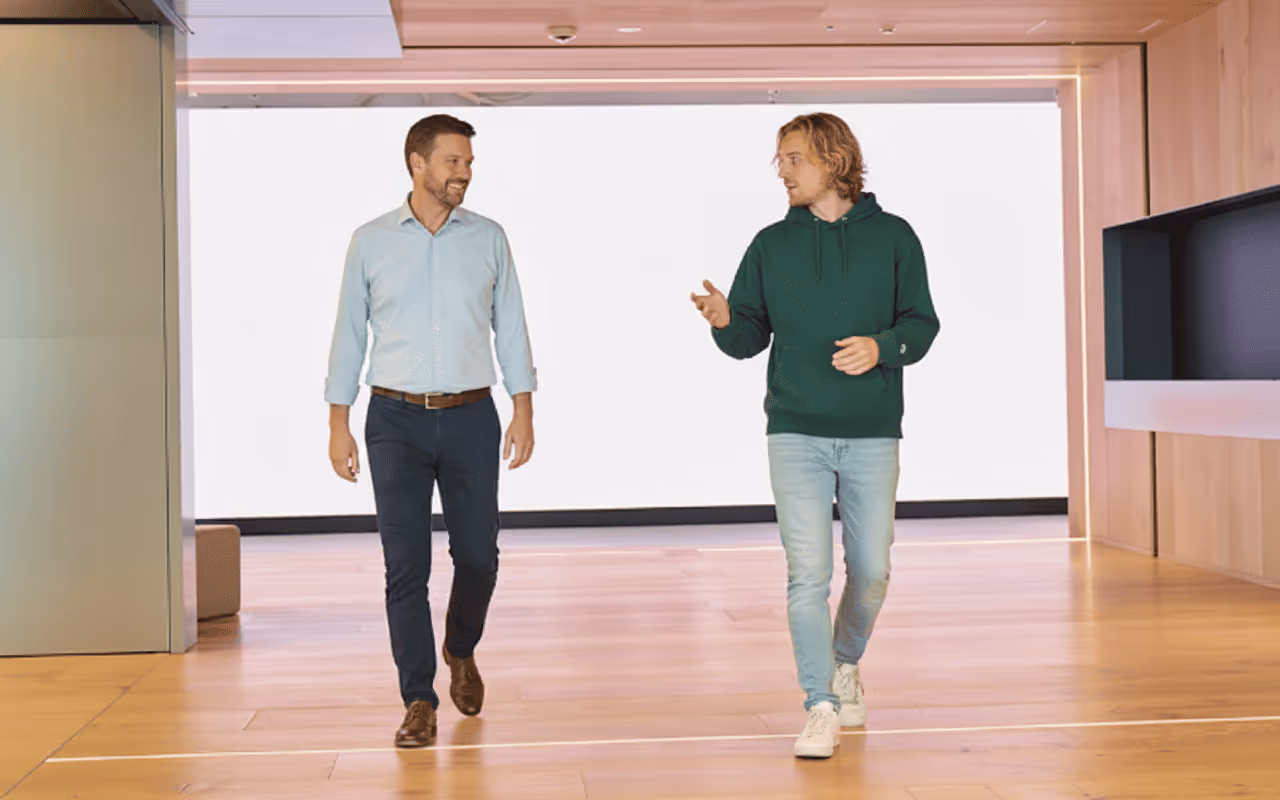Hashman service leads walking the headquarters floor between bays